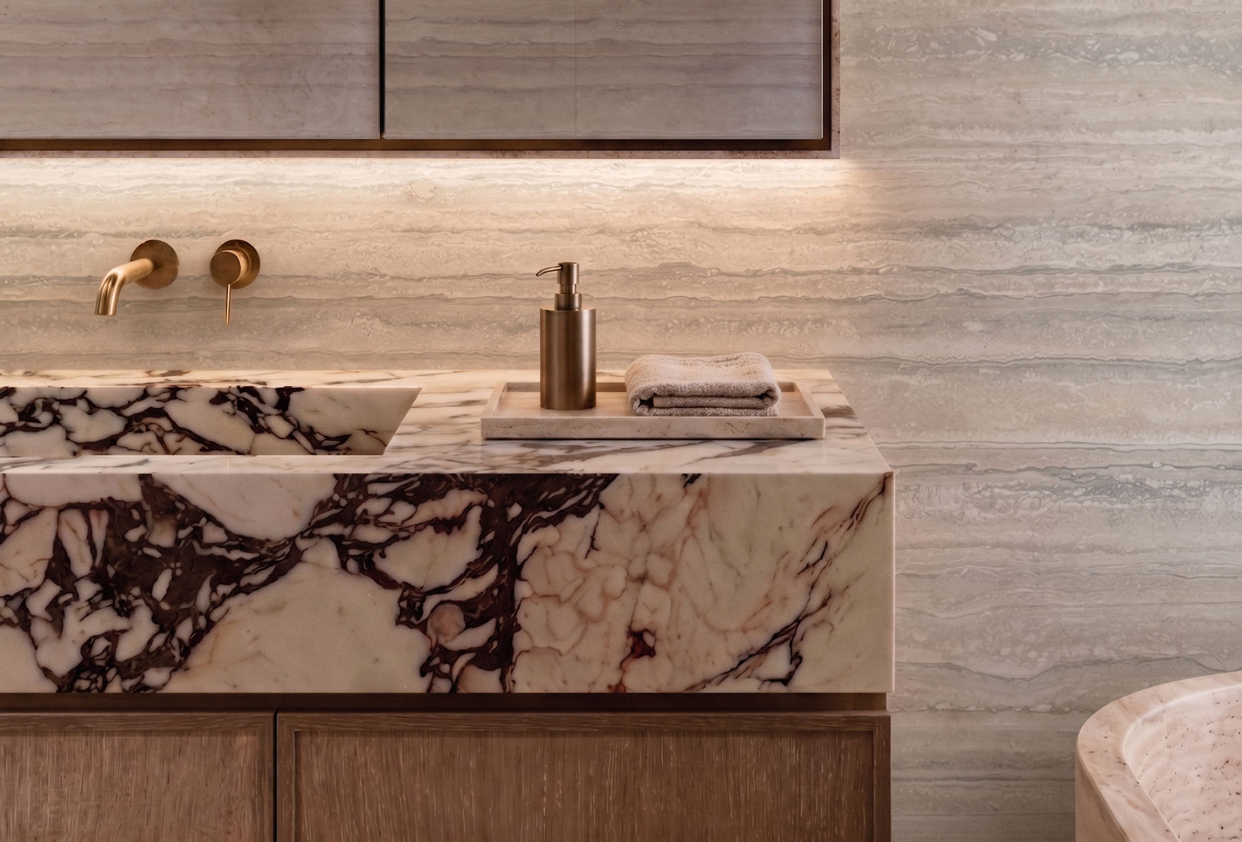Russell Lea Residence ensuite bathroom in honed natural stone and timber joinery — interior design Sydney by Mike & Morlly Architects