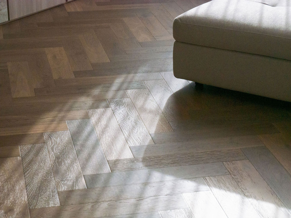 Clara Residence herringbone oak timber floor in soft natural light — residential interior detail by Mike & Morlly Architects, Sydney